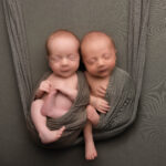 twin babies on a green blanket by Hull newborn photographer